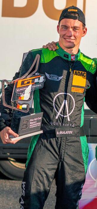 Denis Bulatov racecar driver Abu Dhabi Yas Marina Grand Prix GT4 class with Keith Gatehouse and Ramez Azzam.